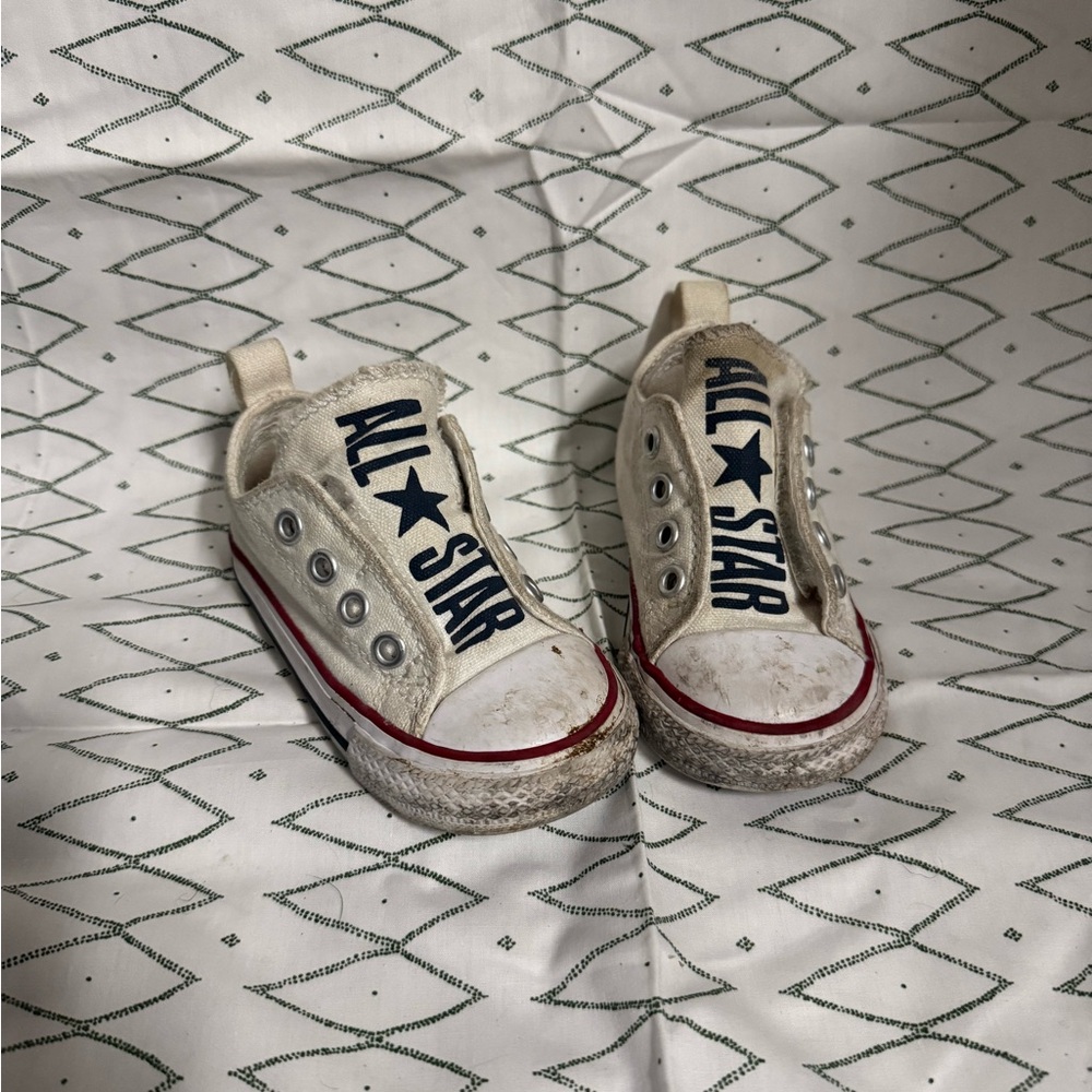 Converse White Canvas Slip-On Low Tops with Navy Logo and Red Midsole Stripe